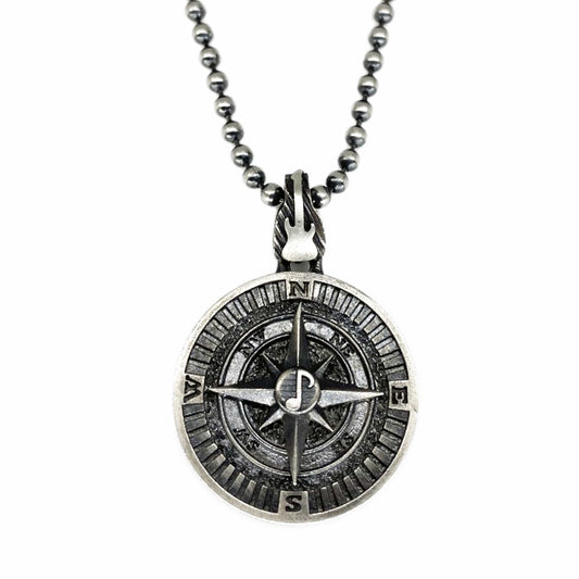 THE COMPASS