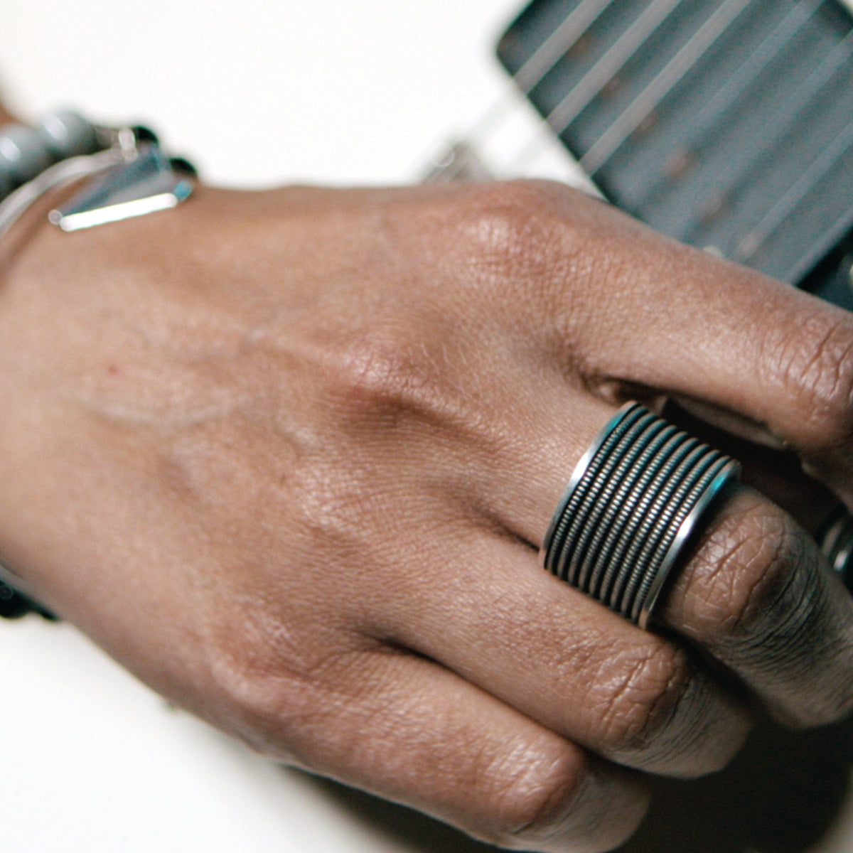 STRINGS OF METAL