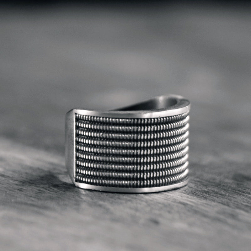 STRINGS OF METAL – Strung