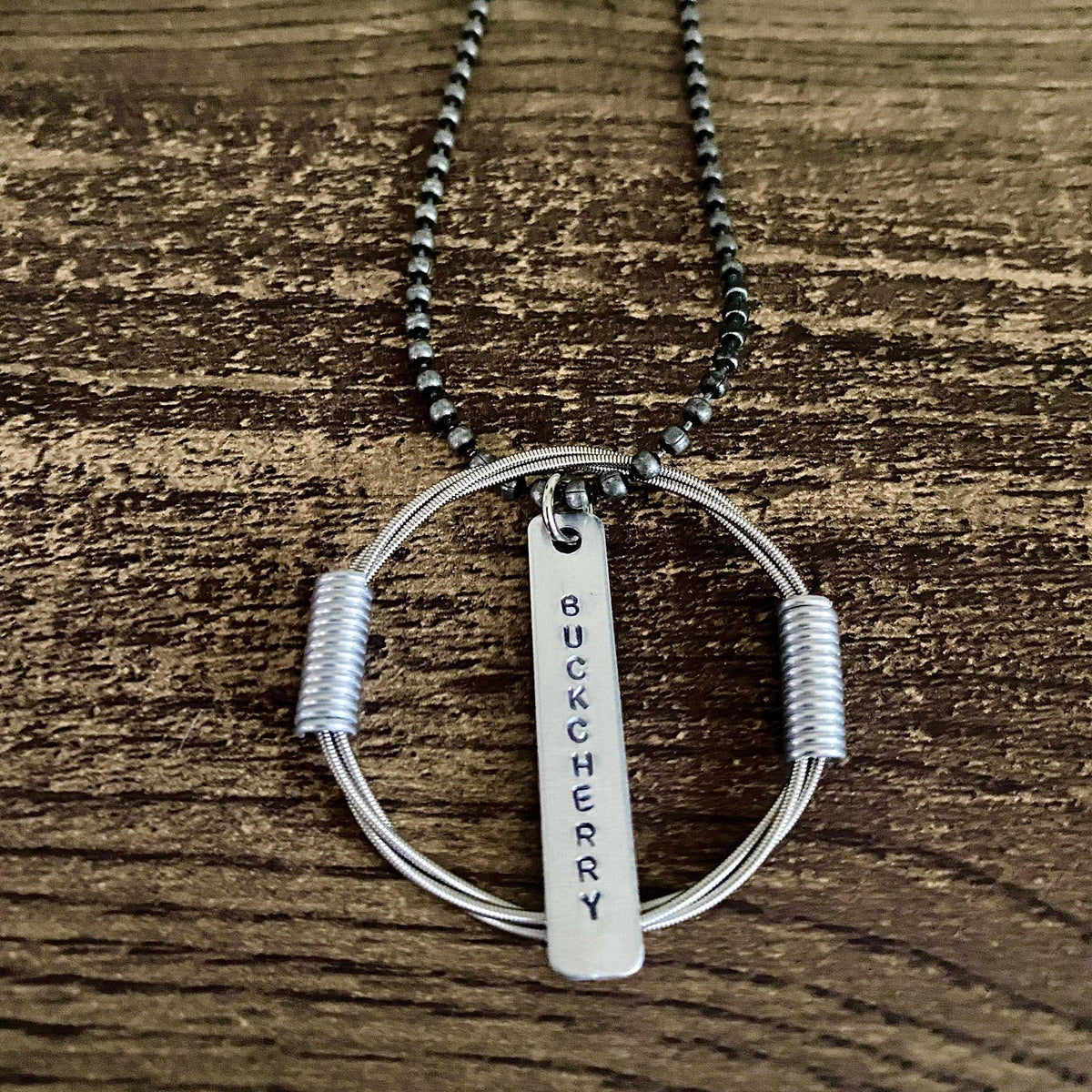 BUCKCHERRY GUITAR STRING NECKLACE