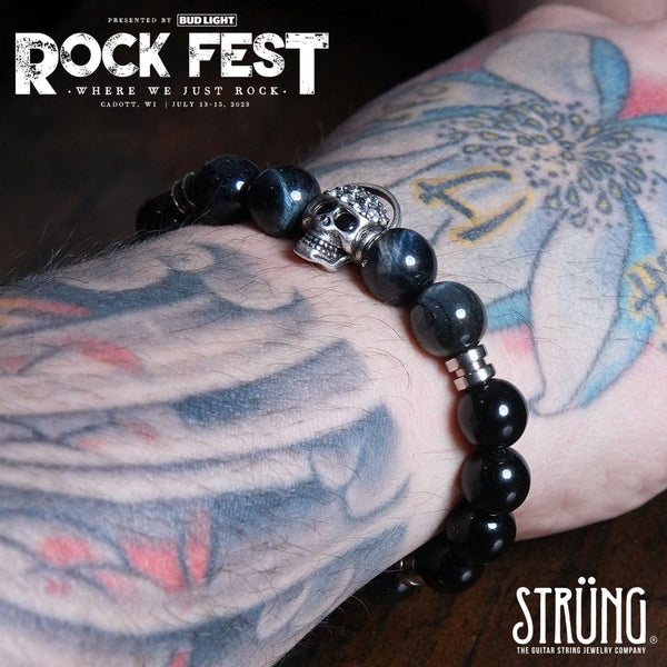 Official festival bracelet of Rock Fest 2023 Cadott, WI The Rocker Skull Bracelet Guitar String Strung Official Get Strung
